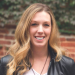 Smiling white woman with long light-brown hair