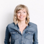 Smiling white woman with shoulder-length blonde hair